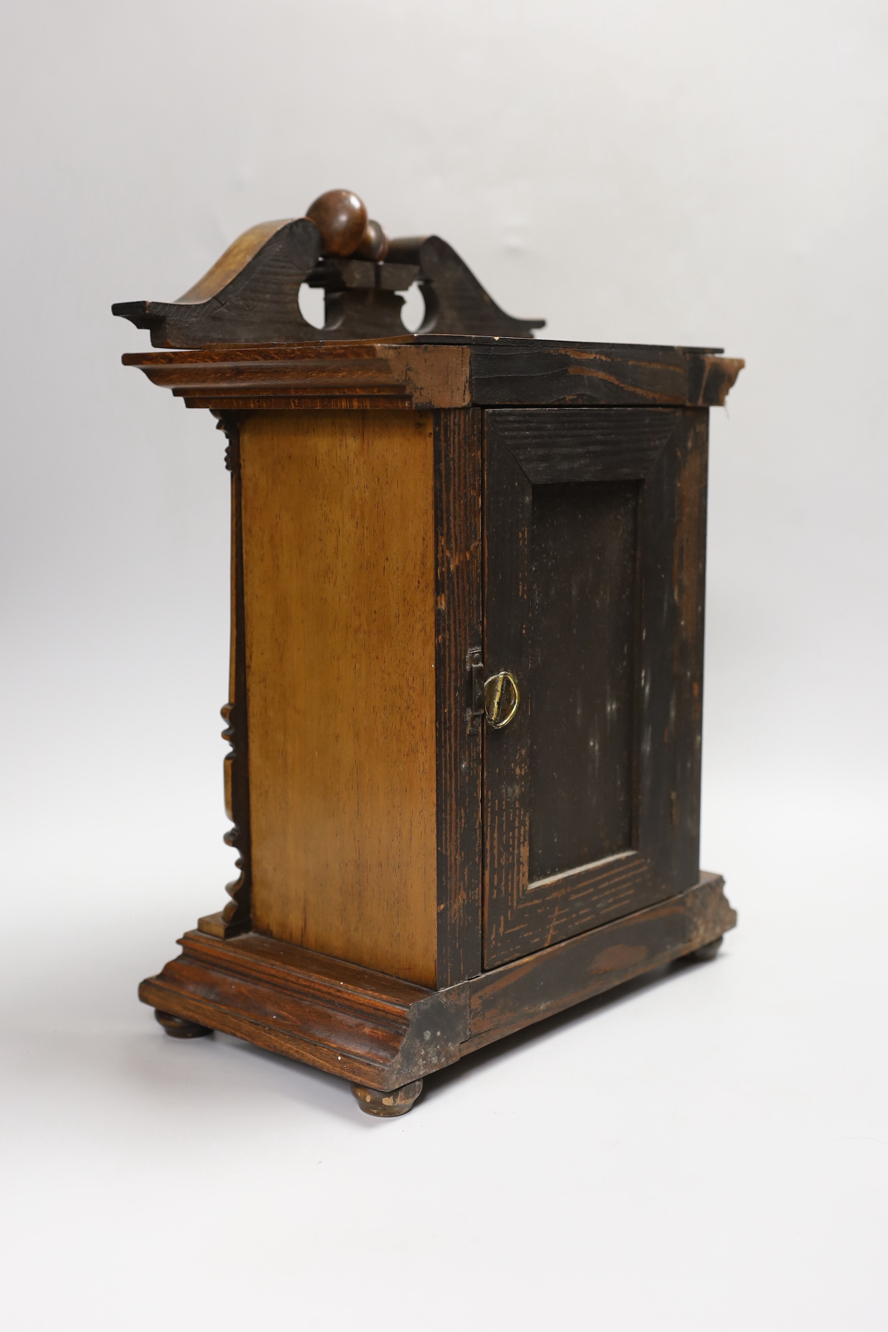 A 19th century Black Forest inlaid walnut mantel clock, 37cm high